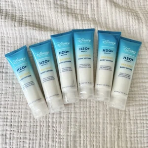 NEU Disney Resorts H2O+ Meersalz Bodylotion H20 Stck 6 Hotels Mini Flaschen - Bild 1 von 2