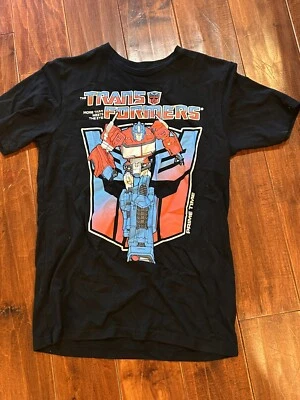Camiseta negra gráfica Transformers Optimus Prime para niño talla XXLarge. (18) Foto 1 de 4