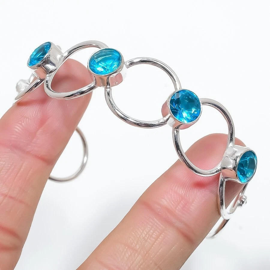 Brazalete ajustable de plata de ley 925 hecho a mano con piedras preciosas de topacio azul suizo Foto 1 de 1