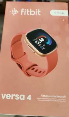 Reloj inteligente Fitbit Versa 4 Fitness - Banda naranja usado Foto 1 de 2