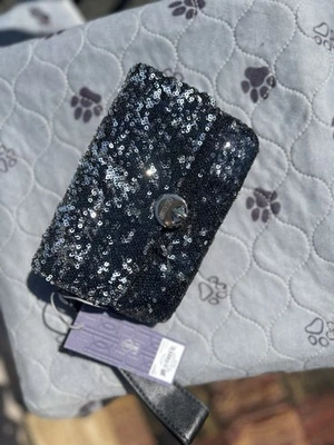 Muñequera Celeste Jennifer Lopez pequeña marroquinería nueva con etiqueta Foto 1 de 4