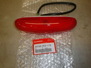 Honda OEM Taillight, 99-04 TRX400EX, 93-00 TRX300EX 87-92 TRX 250X 33700-HC0-770 - Picture 1 of 4