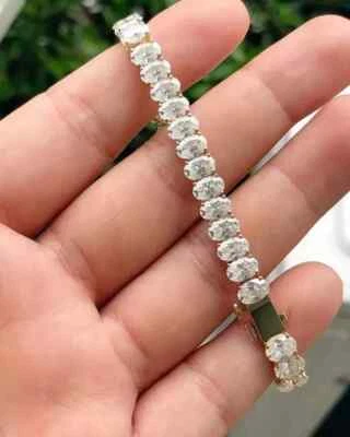 Brazalete de tenis moissanita de corte ovalado de 12 quilates enchapado en oro amarillo de 14 k Foto 1 de 4