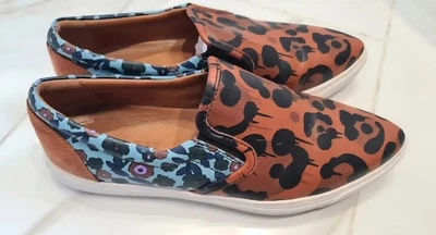 Zapatos planos sin cordones Coach "Wildebeast" con estampado de leopardo, ligeramente usados, envío rápido Foto 1 de 4