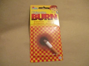 FAKE PRETEND CIGARETTE FAG BURN HOLE FUNNY JOKE BOYS CHILDRENS PRANK GAG PRESENT - Picture 1 of 2