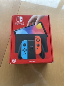 Nintendo Switch (OLED-Modell) neon-blau/neon-rot neon-blau neon-rot ** - Bild 1 von 3