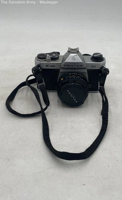Pentax K1000 SE Silver Black 35 mm SLR Film Camera With 50mm F/2 Lens And Strap - Image 1 of 4