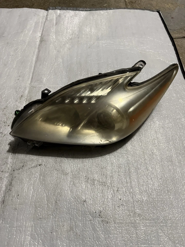 Conjunto de faros halógenos del lado izquierdo del conductor Toyota Prius 2010-2015 OEM Foto 1 de 1