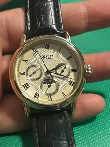 Orologio Stauer Magnificat II automatico uomo 40 mm quadrante argento tono oro data giorno - Foto 1 di 21