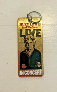 HUEY LEWIS AND THE NEWS IN CONCERT 2-SIDED GOLD METAL KEY CHAIN 1 .5 X 5 INCHES! - Picture 1 of 4