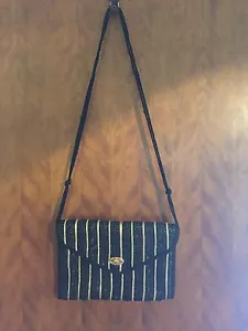 Bolso de mano con correas de paja dorado negro y dorado - Imagen 1 de 6