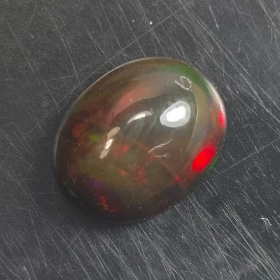 1.35Cts Natural Etíope NEGRO Ópalo Arco Iris Juego de Color Cabina OVAL M564 Foto 1 de 4
