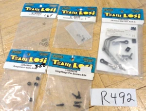TEAM LOSI VINTAGE 5 PAQUETES DE PIEZAS SURTIDAS PARA DIFERENTES COCHES NUEVO EN PAQUETE - Imagen 1 de 11