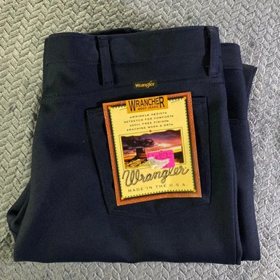 Pantalones de mezclilla Wrangler para hombre 44x32 azul marino poliéster resistente a las arrugas EE. UU. Foto 1 de 4