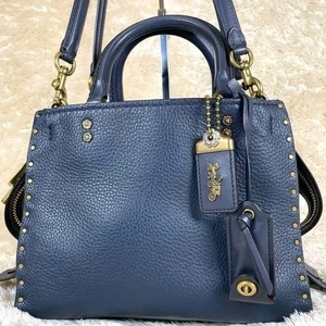 Coach Rogue 25 2Way Leather Handbag Navy Gold Flower Charm - Picture 1 of 17
