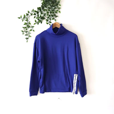 Camiseta deportiva para mujer Nike azul manga larga forrada de lana cuello alto talla pequeña Foto 1 de 4