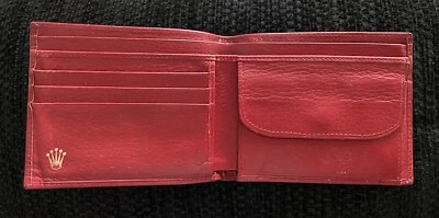 Auténtica billetera Rolex de cuero rojo doble pliegue  Foto 1 de 2