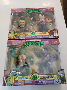 2021 TMNT Leonardo vs Rocksteady & Michelangelo vs Bebop (WALMART EXCLUSIVE) - Picture 1 of 10