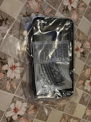 2016-2023 Toyota Tacoma Front License Plate Holder Bracket Frame Genuine OEM - Image 1 of 2