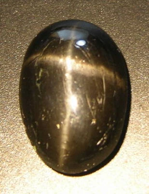 Cabujón de diopsido estrella 4 rayos negro 100 % natural África 8,00 quilates 1,60 g 16 mm Foto 1 de 4