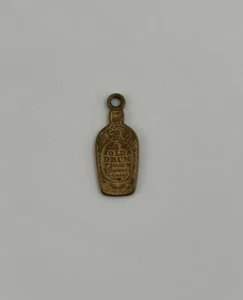 Vintage Old Drum Blended Whiskey Metal Lucky Piece Charm - Picture 1 of 3