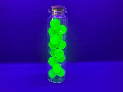 Uranium Glass Large Vile Of 15 Marbles 1cm Each, 8cm Tall Vile Glows Green - image 1 of 4