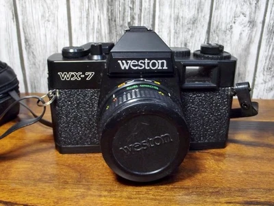 Cámara fotográfica Weston WX-7 vintage de 35 mm con estuche y tapa de lente Foto 1 de 4