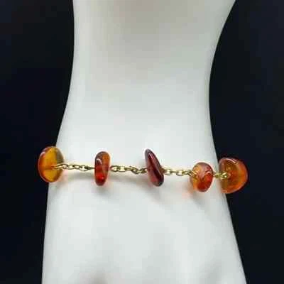 Pulsera ámbar tono dorado, delicada 7 pulgadas, brilla bajo luz negra Foto 1 de 4