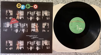 Devo – Dev-O Live ; 1983 UK EP  (VINYL IS EX COVER VG+) - Image 1 of 2