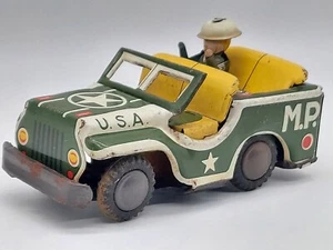 Jeep de juguete vintage de fricción de metal de estaño hecho en Japón - Imagen 1 de 17