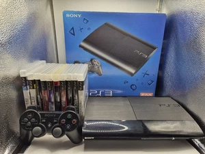 Sony PlayStation 3 (PS3) Super Slim Konsole 500GB mit Spielen In OVP - Bild 1 von 17