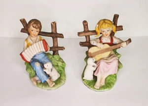 COPPIA FIGURE BAMBINI IN PORCELLANA VINTAGE ADATTE ANCHE COME FERMA LIBRI - Foto 1 di 4