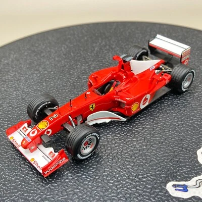 ixo 1/43 Ferrari F2002 #2 Barrichello Winner German GP Nurburgring 2002 SF20/02 - Image 1 of 4