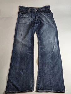 Pantalones de mezclilla AG Adriano Goldschmied "The Symbol" con botones talla 34x32 - Imagen 1 de 2