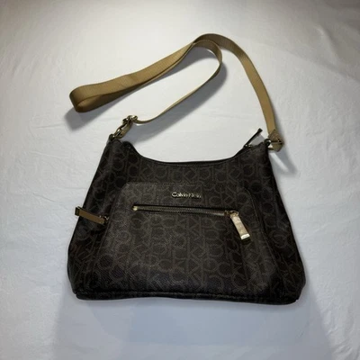 Calvin Klein Brown Crossbody Bag with Monogram Pattern - Image 1 of 4