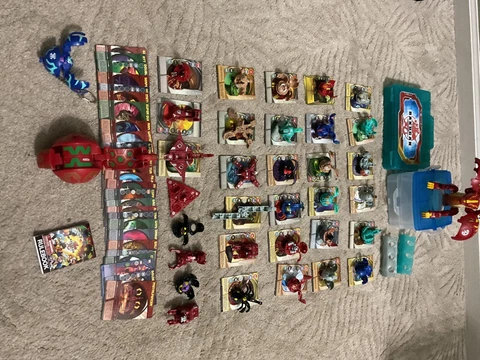 Large set of 32 Bakugan Brawlers including cards, storage and XL brawlers Cover