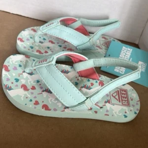 Reef Kleinkind Mädchen 7 kleine Uni breite Riemen Flip Flops Sandalen blau Einhorn - Bild 1 von 2