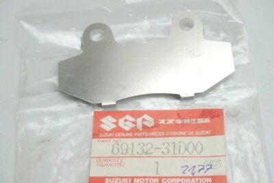 Suzuki Tin Cover Brake Caliper Original 69132-31D00 An Dr Fl Lt - New - Image 1 of 3