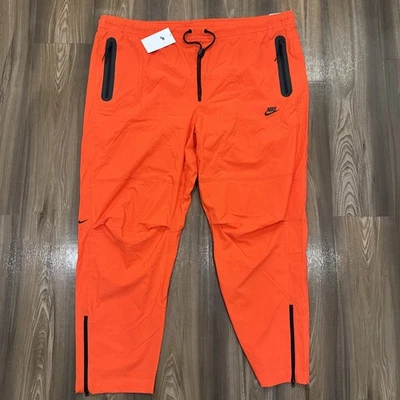 Calça Nike Tech tecido vermelho carmesim claro masculina tamanho 4XL-ALTO 4XT HM8241-696 US$ 125 - Imagem 1 de 4