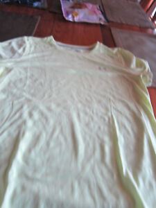New without tags Womens Under Armour Shirt Loose Fit Size XL Color pale yellow