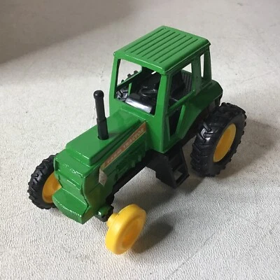 Diecast green farm tractor toy - Image 1 of 4
