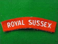 THE ROYAL SUSSEX REGIMENT CLOTH SHOULDER TITLE (115MM)