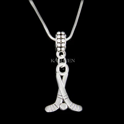 Palo de hockey disco campo jugador de hockey deportes encanto collar papá mamá unisex regalos Foto 1 de 4