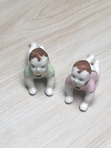 Piano Baby Figurine Crawling Brown Hair Boy/ Girl  Porcelain Figurine Antique - Picture 1 of 6