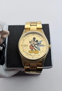 Disney Seiko Mickey Mouse Damenuhr 2A23-0089 goldfarben DayDate NewBatt, funktioniert - Bild 1 von 5