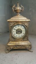 Antique Brass cased Striking Mantel Clock 