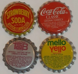Lot 4 Soda Pop Bottle Caps. Coca Cola Classic. Tab. Strawberry Soda. Mello Yello - Picture 1 of 2