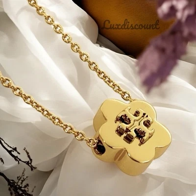 Tory Burch Kira Flor Colgante Collar en Oro Foto 1 de 4
