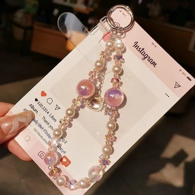 Correa de muñeca ajustable con cuentas de cristal para teléfono celular móvil Foto 1 de 4