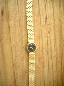 Reloj de cóctel vintage Seiko dorado para mujer con cara negra - Imagen 1 de 3